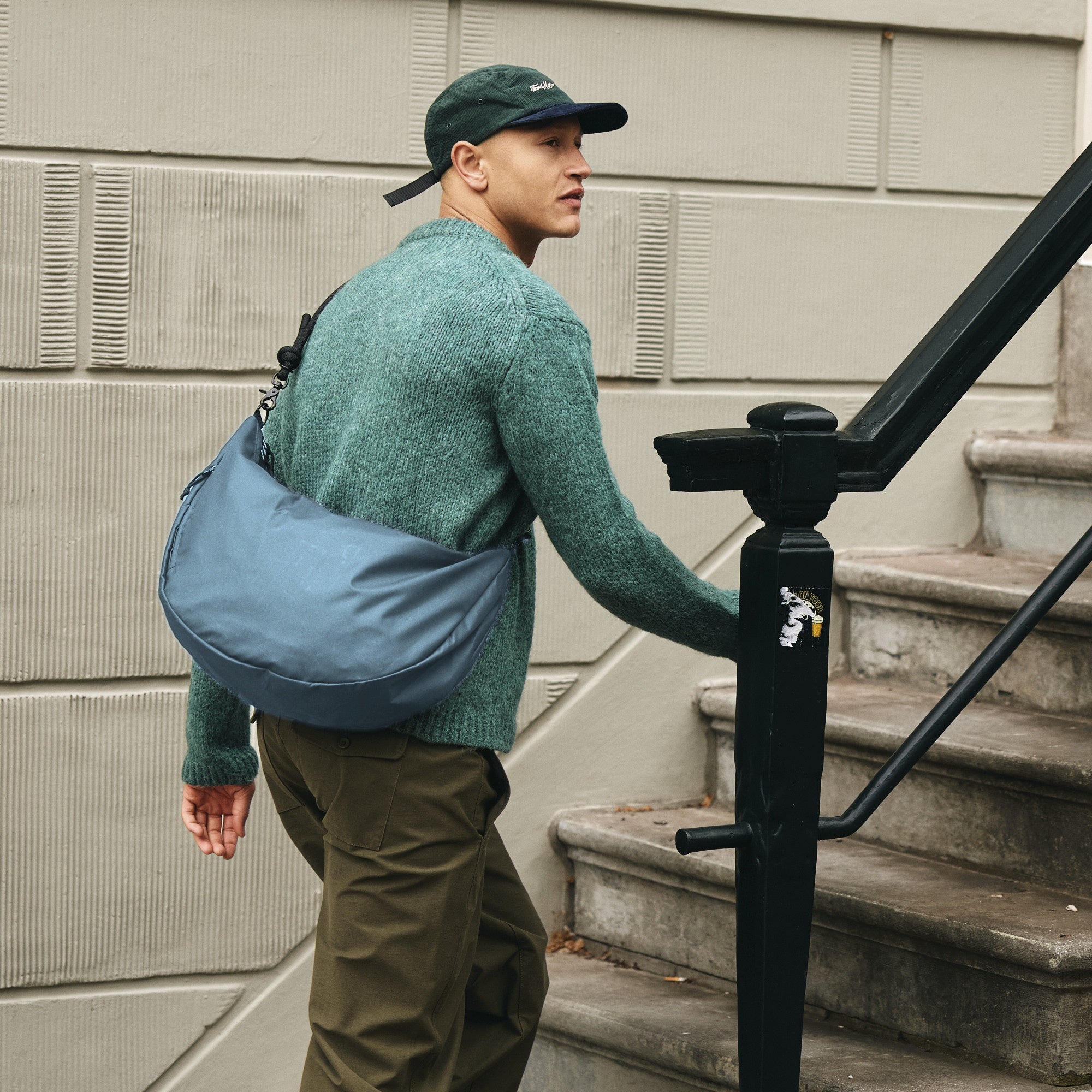 Lea Sling Bag Ocean Blue worn across the body